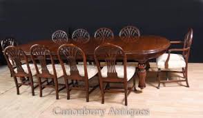 It has a warm chandelier and black dining set. Victorian Dining Sets