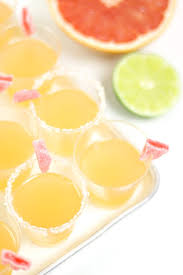 These candy cane jello shots not only look amazing but taste amazing too, they are the perfect holiday treat for any party! Paloma Jello Shots Feast West
