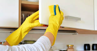 Mix a cabinet degreaser by combining equal parts warm water and warm distilled white vinegar in a spray bottle or bucket. The Best Way To Clean Greasy Kitchen Cabinets Housewife How Tos
