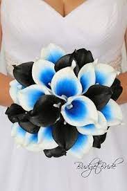 Here are some photos of the details that really added some nice touches to her bouquet. Black And Royal Blue Calla Lily Brides Wedding Bouquet Blue Wedding Flowers Blue Themed Wedding Blue Wedding Decorations