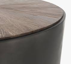 The rustic wood surface and modern metal legs work together to create a mixed style, increasing a beautiful look to your room and lightening your home as well. Brockton 39 5 Round Reclaimed Wood Coffee Table Pottery Barn