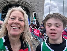 Young runner with Down's syndrome who danced his way through the New York  Marathon reveals he has his sights set