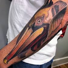 50 Pelican Tattoos For Men Water Bird Design Ideas In 2020 Pelican Tattoo Tattoos For Guys Tattoos