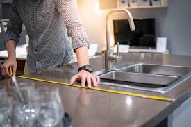A hard slab of granite, or quartz, including edges and backsplashes, goes on top of the existing countertop. How To Install A Quartz Countertop 8 Tips For Success Hanstone Quartz