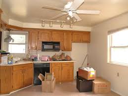 To ease your search for a tool to aerate your cooking space, we have compiled a list of the best kitchen ceiling fans with lights. White Kitchen Fan Ceiling Ideas Belezaa Decorations From Best Kitchen Ceiling Lights Ideas Pictures