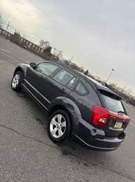 Image result for Dark Charcoal 2011 Caliber