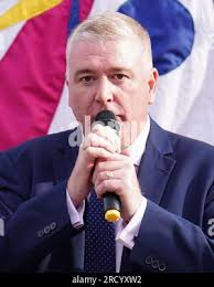 Paul O'Connor PCS Senior National Officer speaks to demonstrators at a  protest against the Illegal Migration Bill in Parliament Square,  Westminster, as the bill proceeds through parliament. Picture date: Monday  July 17, 2023 Stock Photo