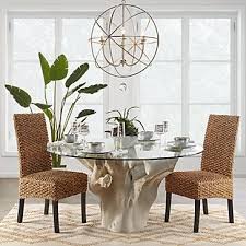 The root holds up the the surface of the table like a branching hand. Sequoia Dining Table Decor Affordable Modern Furniture Round Dining Room