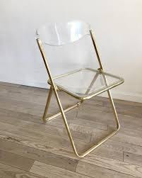 Stylish Folding Chairs Are A Great Space Saving Investment Folding Chair Folding Dining Chairs Art Chair