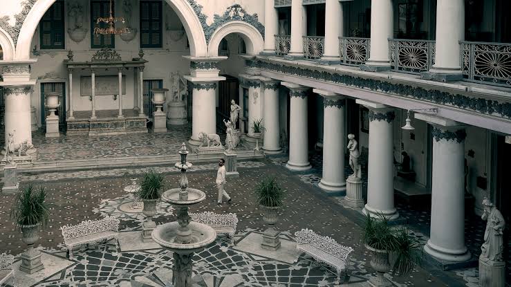 Timeless classical courtyard inside North Kolkata's Marble Palace, AI generated