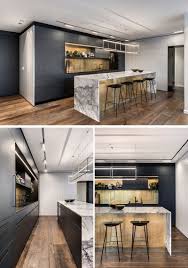 In This Modern Kitchen Matte Black Cabinets Have Been Combined With A Gold Meta Interior Design Kitchen Small Modern Kitchen Interiors Interior Design Kitchen
