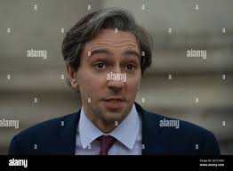 Simon Harris, Minister for Further and Higher Education, Research,  Innovation and Science, speaks to media at his arrival at Government  Buildings in Dublin. On Tuesday, 13 April 2021, in Dublin, Ireland. (Photo