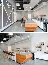 This Modern Coffee Shop Has A Palette Of Grey White And Wood Modern Coffee Shop Coffee Shop Interior Design Coffee Shops Interior