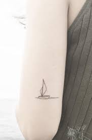 Little Boat Tattoo Inkstylemag Sailboat Tattoo Boat Tattoo Sailing Tattoo