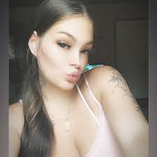 HELP ME IDENTIFY THIS PERSON PLEASE! She has been snooping around casing  properties and taking video or pictures of the inside of people's houses.  This has been reported to law enforcement already