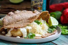 Sauerkraut stands in for pickles in this classic pressed sandwich of ham, swiss cheese, and mustard. Beer Battered Reuben Fish Tacos What Jew Wanna Eat