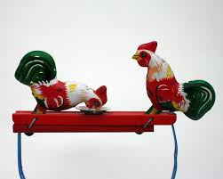 The rest will be placed in a rooster bachelor pad on another piece of. Vintage Pecking Roosters Chickens Hens Tin Toy Noise Etsy Chickens Tin Toys Rooster