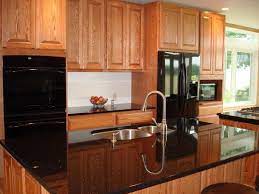 Kitchen with oak cabinets and black appliances ideas and tips in the effort to create amazingly beautiful and attractive kitchen with oak cabinets, the color combination should be well considered. Gorgeous Kitchens With Black Appliances Design And Ideas Cherry Cabinets Kitchen Kitchen Colors Kitchen