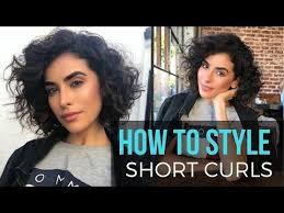 Wrap the second section around the first and secure it with a bobby pin, then gently tug. How To Style A Blunt Bob When You Have Curly Hair Fashionista Short Curly Hair Curly Hair Styles Curly Hair Styles Naturally