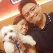 Nah. She didn't do a single pull-up because her chin didn't go up above the  bar, and you didn't do a single pull-up since you had to show off and do  muscle