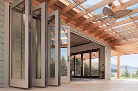 Bifold patio doors provide the flexibility and convenience to extend your living space and expand your horizon. Big Doors Moving Glass Wall Systems Andersen Windows