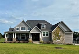 A deep red on your home's exterior siding gives a traditional look while still having a pop of personality. Gray Siding Is Trending For 2021 Vinyl Siding Colors Siding Colors Vinyl Siding