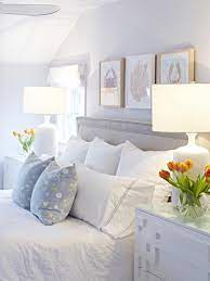 This Coastal White Bungalow Has A Light Airy Feel It Has A Nautical Theme And Features Both Blue Small Master Bedroom Master Bedrooms Decor Bungalow Bedroom