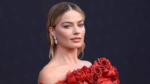 Every time Margot Robbie referenced a specific Barbie on the red carpet 