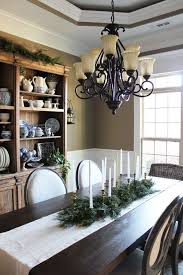 Traditional Rustic Christmas Decor With Brass Candlesticks And Greenery The Hamby Home Decor Rustic House Christmas Decorations Rustic