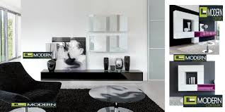 Two open shelves above and underneath the tv panel allow to store small things, but the major bulk of the unit is its unusual shape. Blog Exclusive And Modern Wall Unit Design Ideas Modern Tv Wall Units Modern Tv Wall Units Design