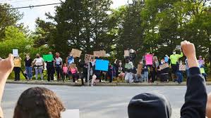 Photo Gallery: Protest at Mashpee Rotary