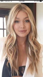 A dark brown base looks great with light blonde highlights throughout. Gigi Hadid Tumblr Gigi Hadid Ash Blonde Hair