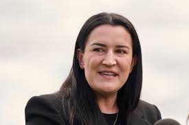 AFL football boss Laura Kane says Richmond Tigers best placed to support  AFLW troll victim Kate Dempsey