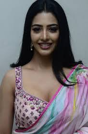 So coming to মিউজিক is in the মিউজিক মিউজিক mark আর she's a fantastic actress uh so uh she's very cool uh zombie zombie zombie uh definitely. Daksha Nagarkar In Saree Stills At Zombie Reddy Movie Teaser Launch