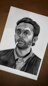 This graphite pencil artwork portrays Arjun Ashokan from the movie  Thalavara, capturing the raw emotion and inner conflict of his character.  Through delicate shading and fine detailing, the portrait reflects the  silent
