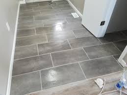 Trafficmaster Coastal Grey 12 In X 24 In Vinyl Tile Flooring 29 Sq Ft Case 24716c The Home Depot Vinyl Flooring Bathroom Bathroom Vinyl Best Bathroom Flooring