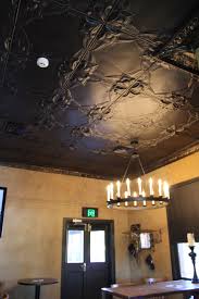 Pressed Tin Ceiling Add Drama By Painting Panels A Dark Colour These Beautiful Carrington Panels Are Available Tin Walls Pressed Metal Ceiling Tin Ceiling