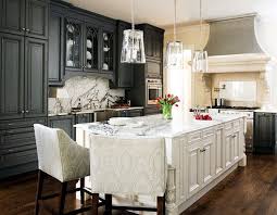 Seating At The Foot Of The Island Gray And White Kitchen Grey Kitchen Cabinets Kitchen Design