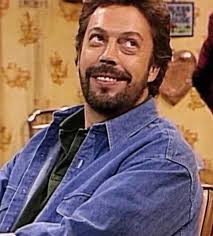 I'm sure if you made it, Roseanne, it will be delicious…” “Cool it, Roger.  Dan doesn't like it when I'm lied to by other men.” 📸: Tim Curry as Roger  in 'Roseanne'