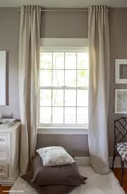 An easy way to make cafe curtains for your kitchen is to cut down a pair of long drapes you already own. Easy Homemade Window Treatments