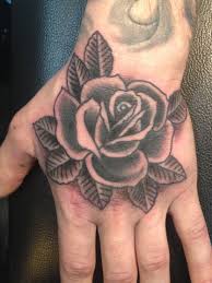 Traditional Black And Grey Rose Hand Tattoo By Sara Purr Sarapurr Com Hand Tattoos Traditional Rose Tattoos Rose Hand Tattoo