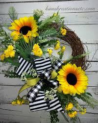 The size of wreath needed for your front entrance really depends on the look you want. Summer Wreath Summer Sunflowers Large Sunflowers Sunflower Wreath Black And White Summer Door Wreath Front Door Wreath Yellow Flowers Beautiful Wreath F Summer Door Wreaths Wreath Decor Wreaths For Sale