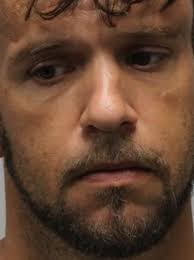 Man charged with stabbing another man with 2 children present