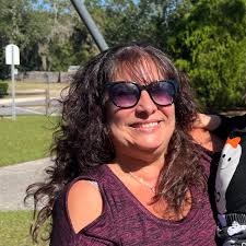 HELP! Who can help with an injured squirrel in my backyard??