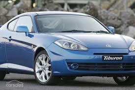 Image result for Sunny Yellow 2004 Tiburon