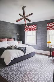 A structured grey bedroom idea for a stunning, straightforward bedroom. Charcoal Gray Bedroom With Red Accents Contemporary Bedroom