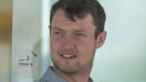 Man accused of hitting policeman with car appears in court