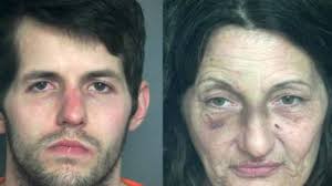 Police said a woman practiced karate moves in the parking lot of a Walmart  while her son was naked inside the store. , http://bit.ly/2KA7RVB