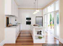 The idea is that the kitchen should look like the rest of the house and having plates drying on show is not. Modern Country Kitchen Design Completehome