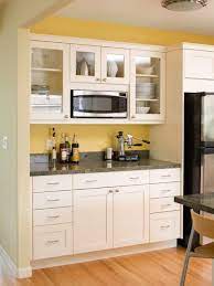 10 small kitchens and storage tricks that inspired us this year new kitchen cabinets contemporary built in microwave cabinet book self design